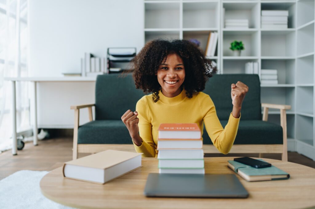 Young African American University International Exchange Students Study Online Showing fight, Cheer